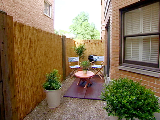 AFTER view of outdoors area on Designed to Sell - Bamboo fence